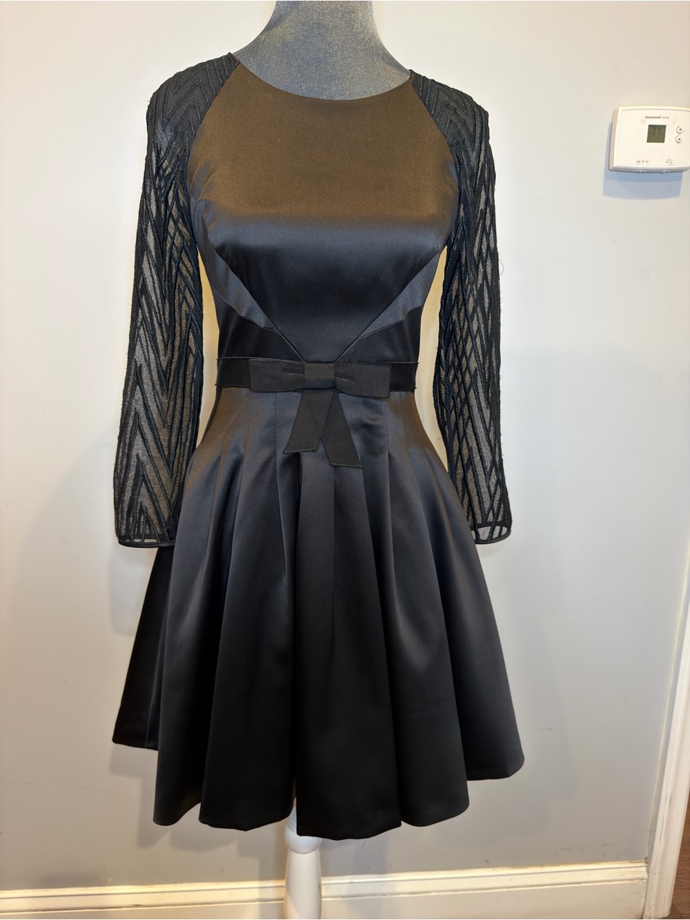 Karen Millen Black Fit-and-Flare Dress with Sheer Patterned Sleeves
